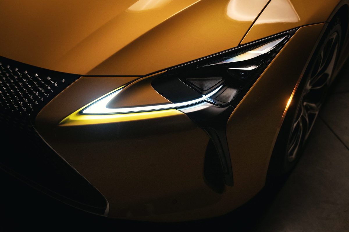 Close detail of the LC 500 headlight and spindle grille