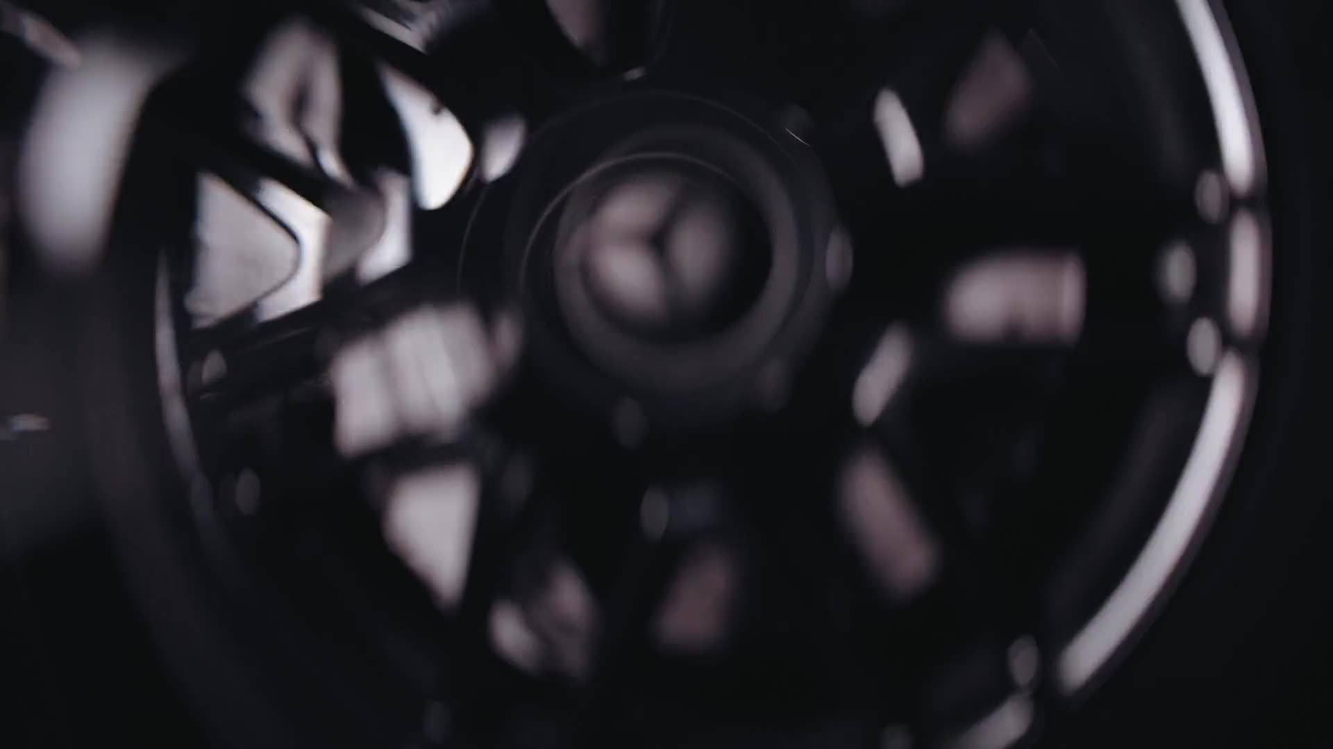 Mercedes AMG headlight in a dark studio